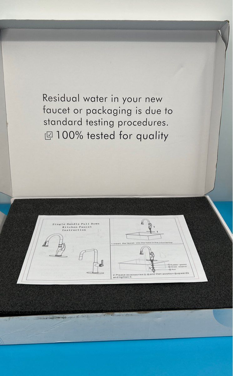 Kitchen Sink Faucet with a lateral drop spout