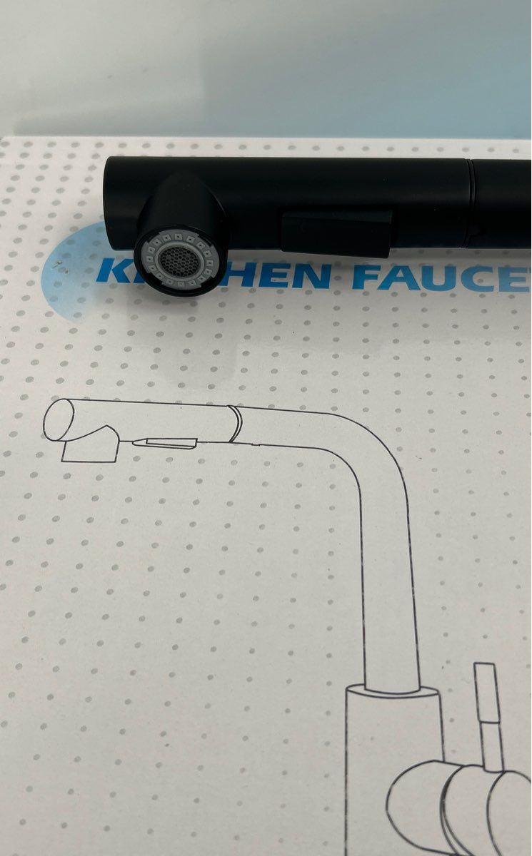Kitchen Sink Faucet with a lateral drop spout