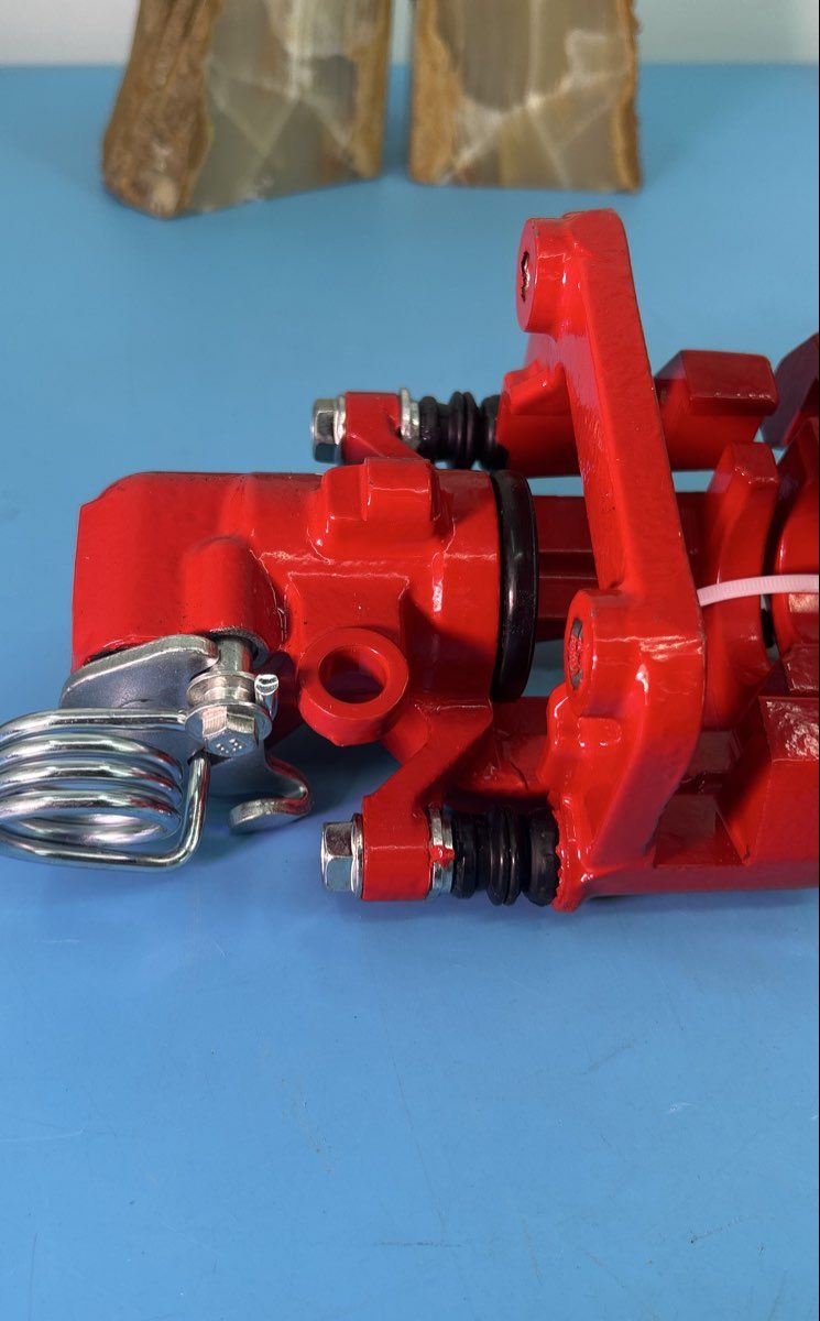 Pair of Dual-Piston Red Brake Calipers with Parking Brake Lever