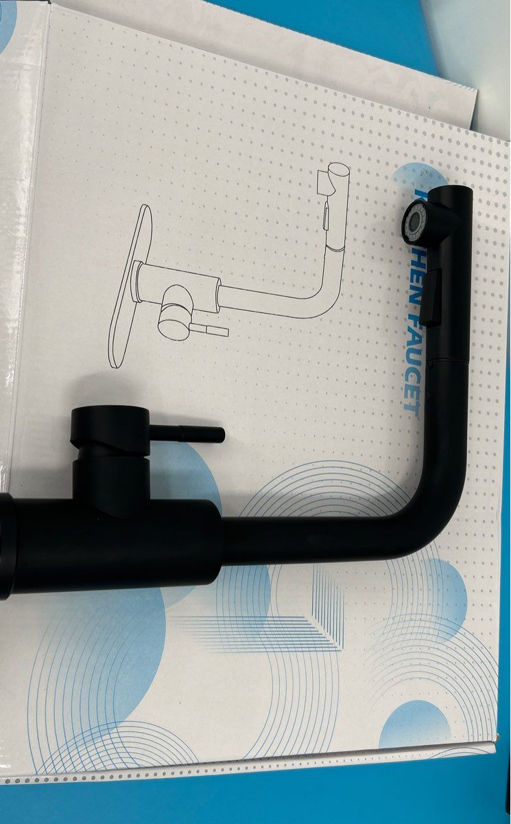 Kitchen Sink Faucet with a lateral drop spout